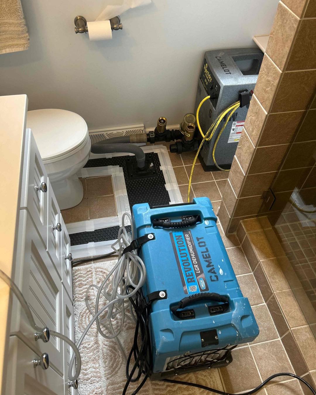 Camelot drying equipment set up on a water-damage job